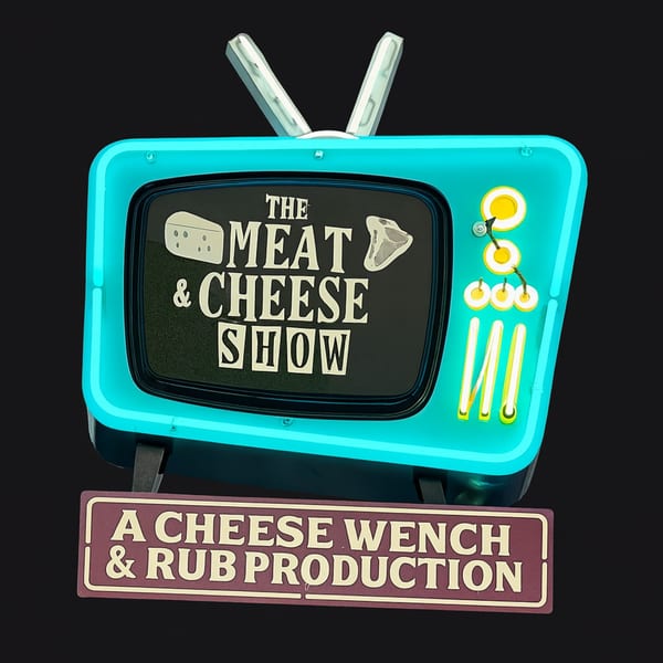 Neon sign shaped like a retro TV, displaying "The Meat & Cheese Show" and "A Cheese Wench & Rub Production".